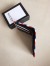 Gucci Bi-fold Wallet In Night Courrier GG Supreme Canvas