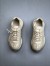 Gucci Women's Rhyton Sneakers in Distressed Leather 