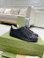 Gucci Men's Ace Sneakers in Black GG Embossed Leather