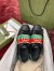 Gucci Men's Ace Sneakers in Black Leather with Elastic Web