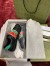 Gucci Men's Ace Sneakers in Black Leather with Elastic Web
