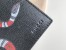 Gucci Bi-fold Wallet In Black Kingsnake Print Leather 