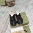 Gucci Men's Rhyton Sneakers in Black Leather Effect Fabric