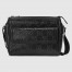 Gucci Messenger Bag in Black GG Embossed Perforated Leather