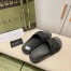 Gucci Women's Slide Sandals in Black Rubber GG